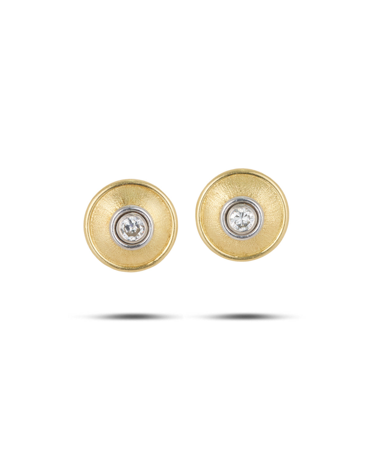 1970's 18ct yellow and white gold diamond earrings . Total diamond weight 0.46 carat.