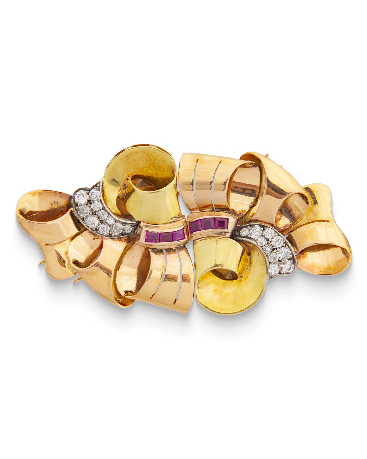 1940s Retro ruby and diamond double-clip brooch in 18ct yellow, rose and white gold, featuring six rectangular-cut rubies and scrolling ribbon design, photographed against a white background.