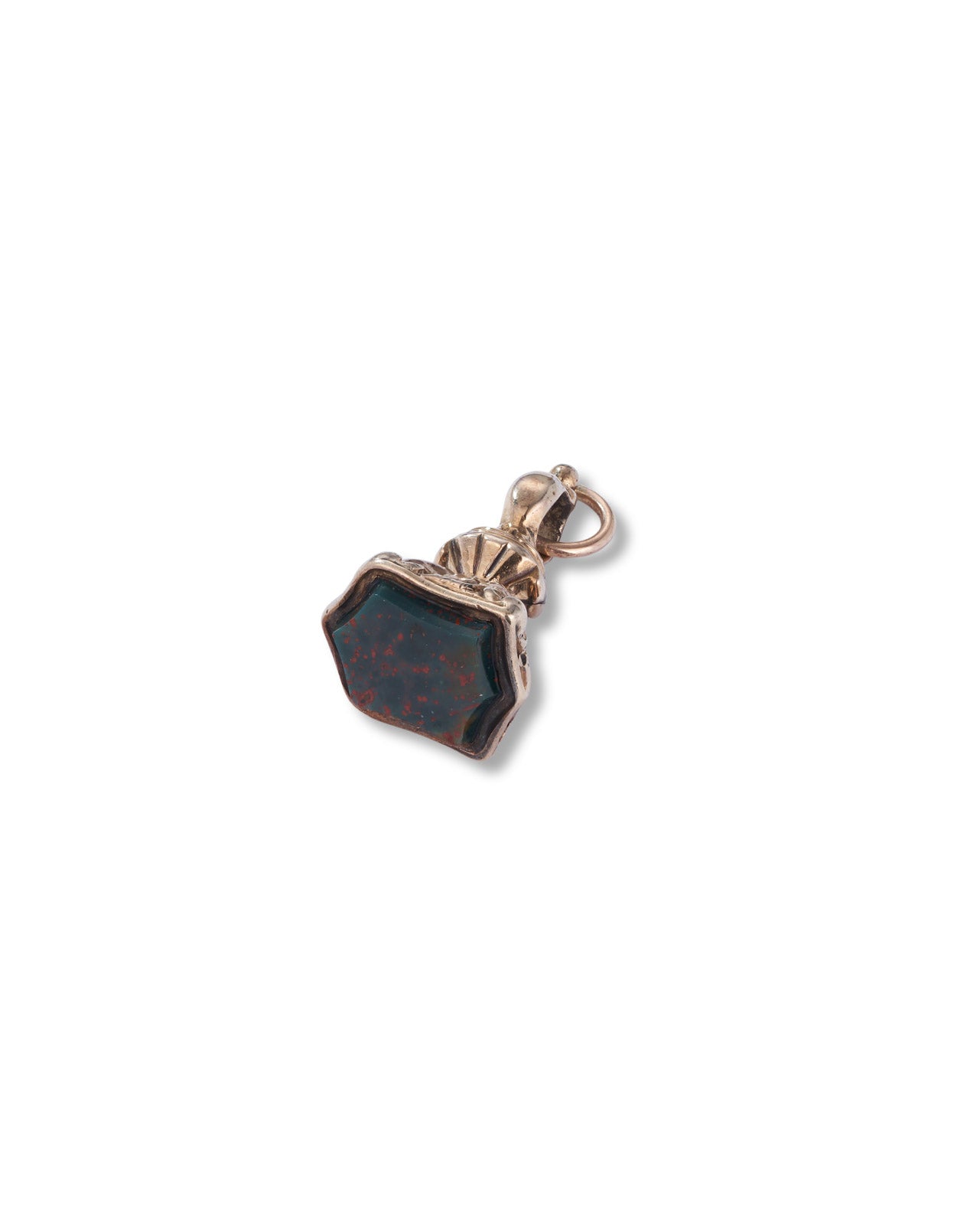 A small hexagonal pendant charm with a dark blue-green stone featuring red matrix, set in a rose gold-toned metal, on a plain white background.