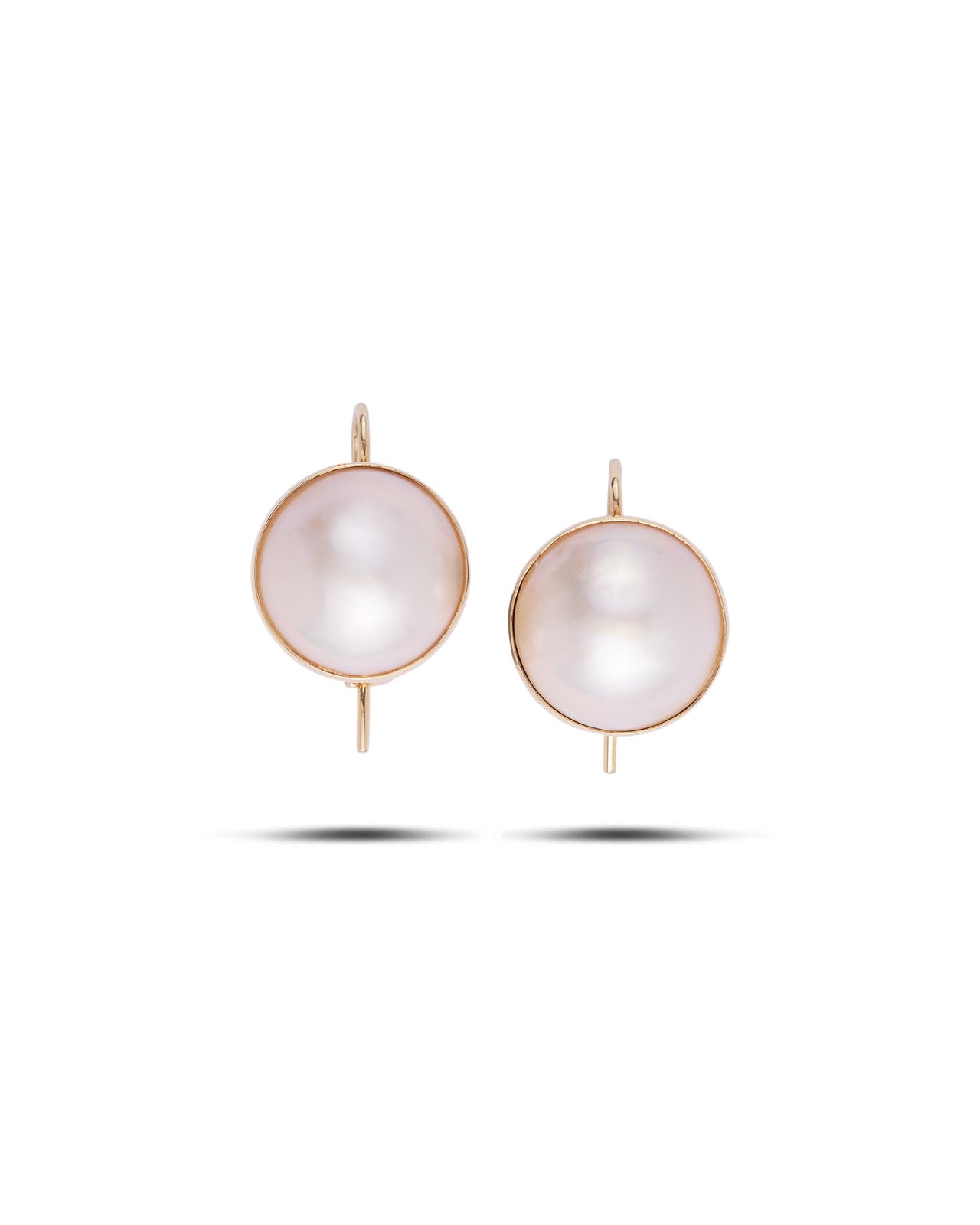 Vintage 18ct yellow gold earrings set with large round mabé pearls and hook fittings.