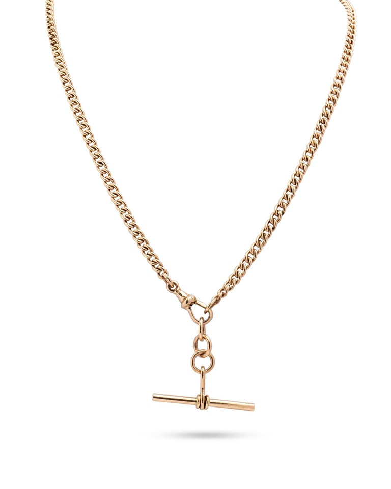 Vintage 9ct Rose Gold Watch Chain. A classic curblink watch chain of good length, complete with detachable T-bar.
Weight 38.27 grams