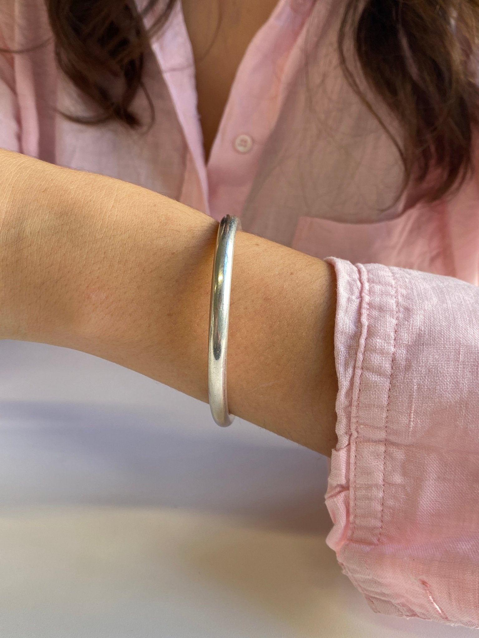 Vintage Sterling Silver Bangle, a classic heavy silver bangle of plain polished oval design