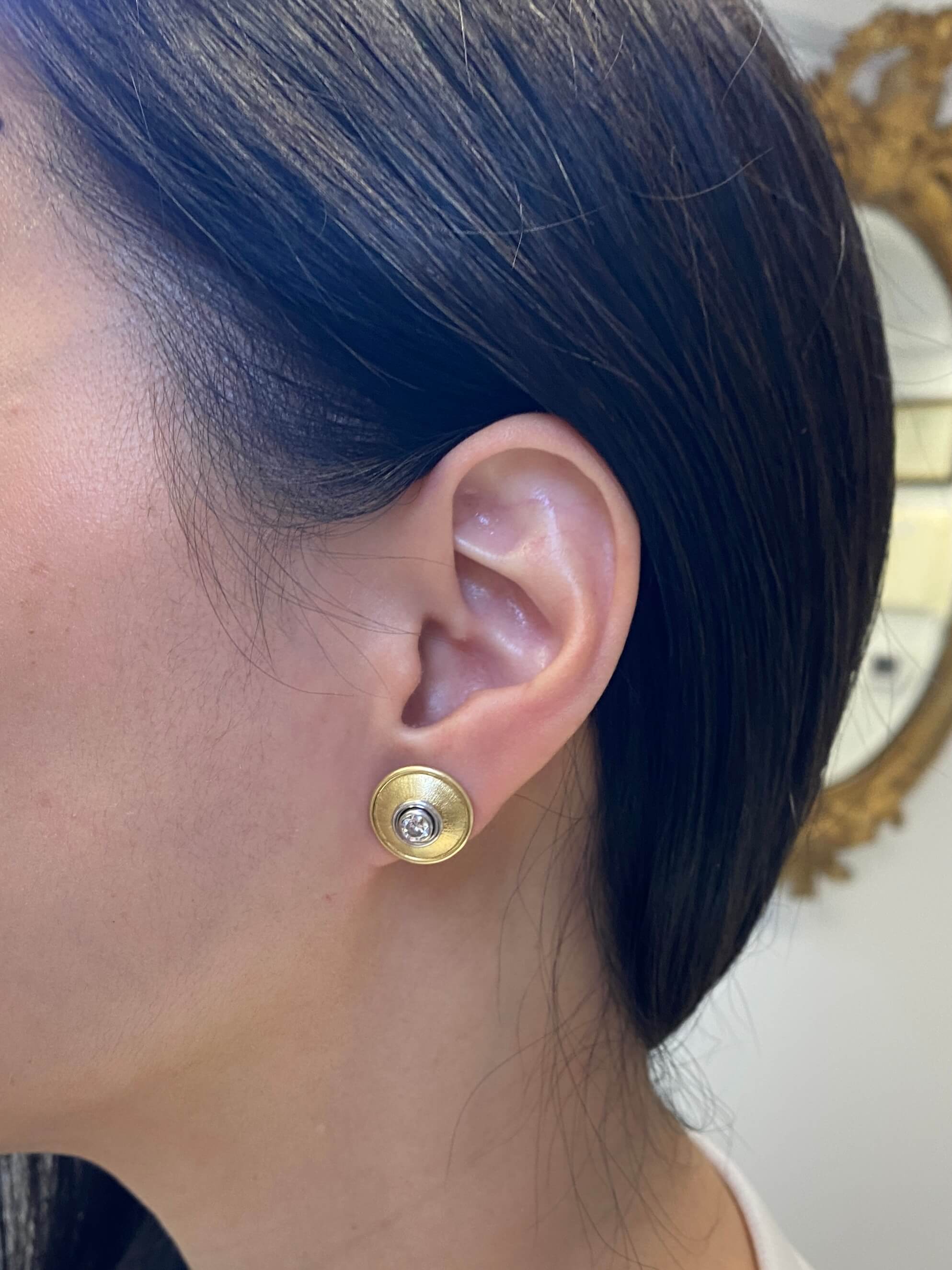1970's 18ct yellow and white gold diamond earrings . Total diamond weight 0.46 carat.