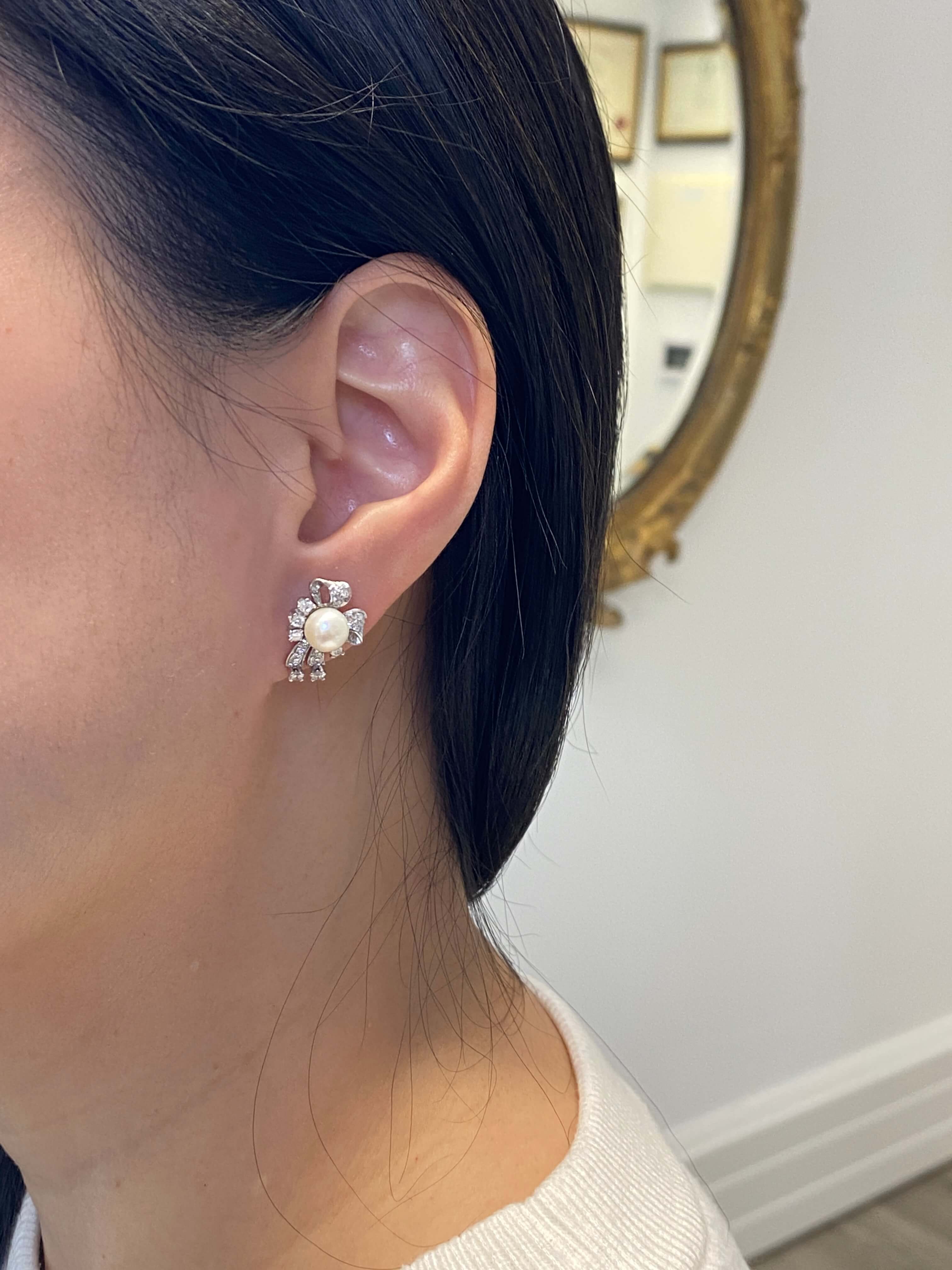 An elegant pair of 18ct white gold Diamond and Pearl Earrings from the 1950's.