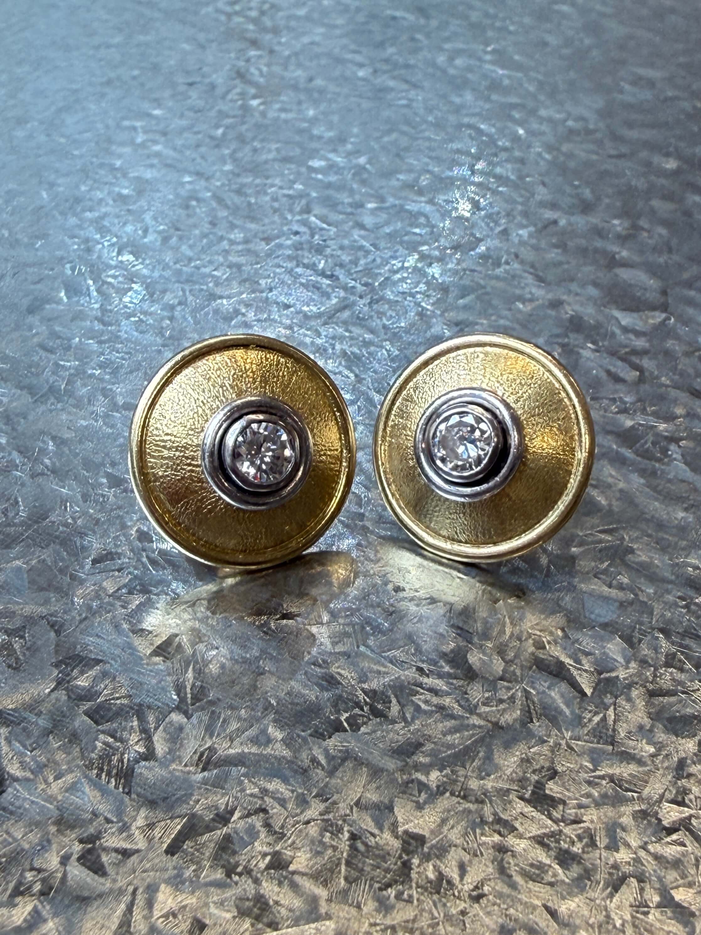 1970's 18ct yellow and white gold diamond earrings . Total diamond weight 0.46 carat.