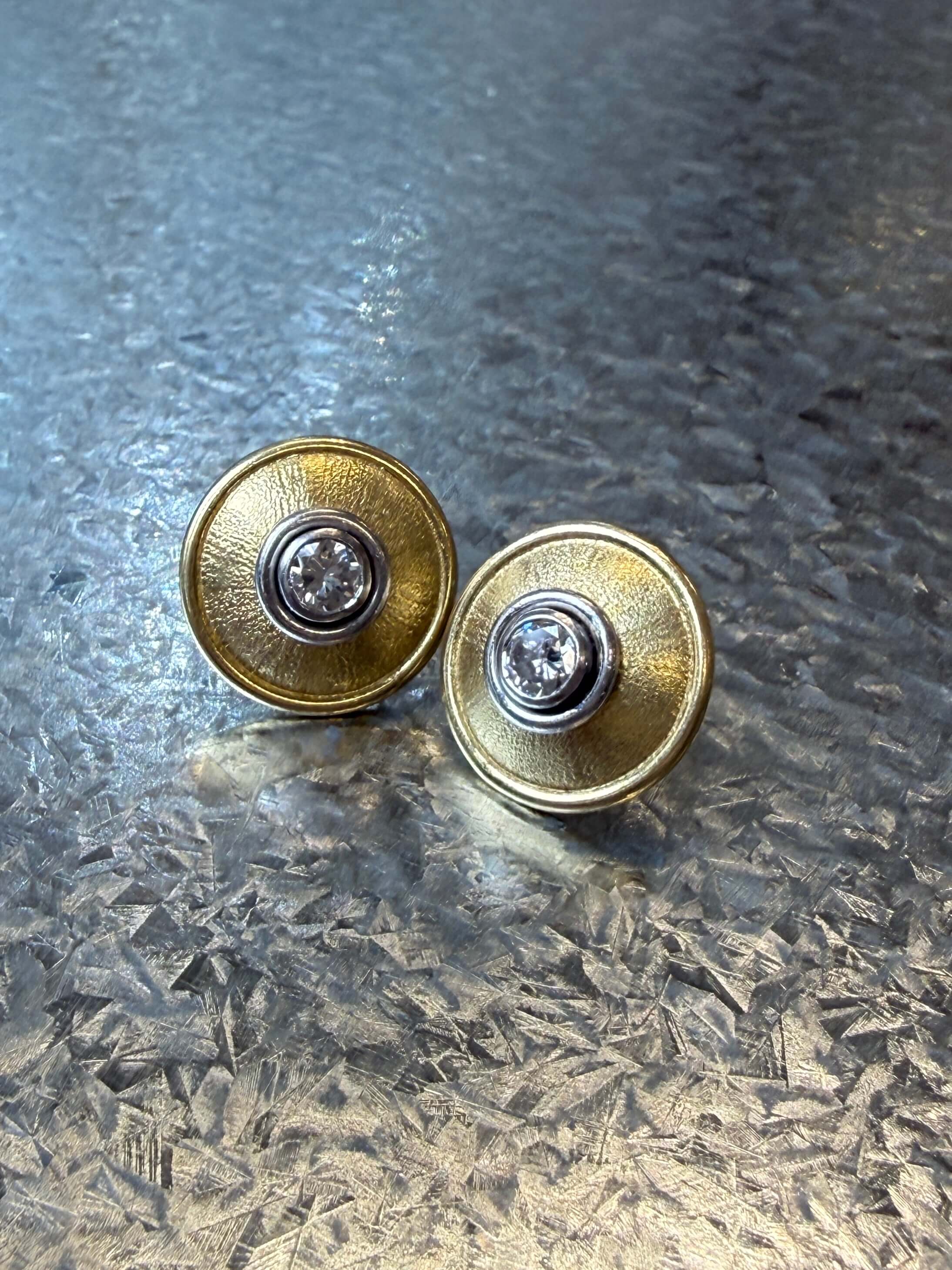 1970's 18ct yellow and white gold diamond earrings . Total diamond weight 0.46 carat.
