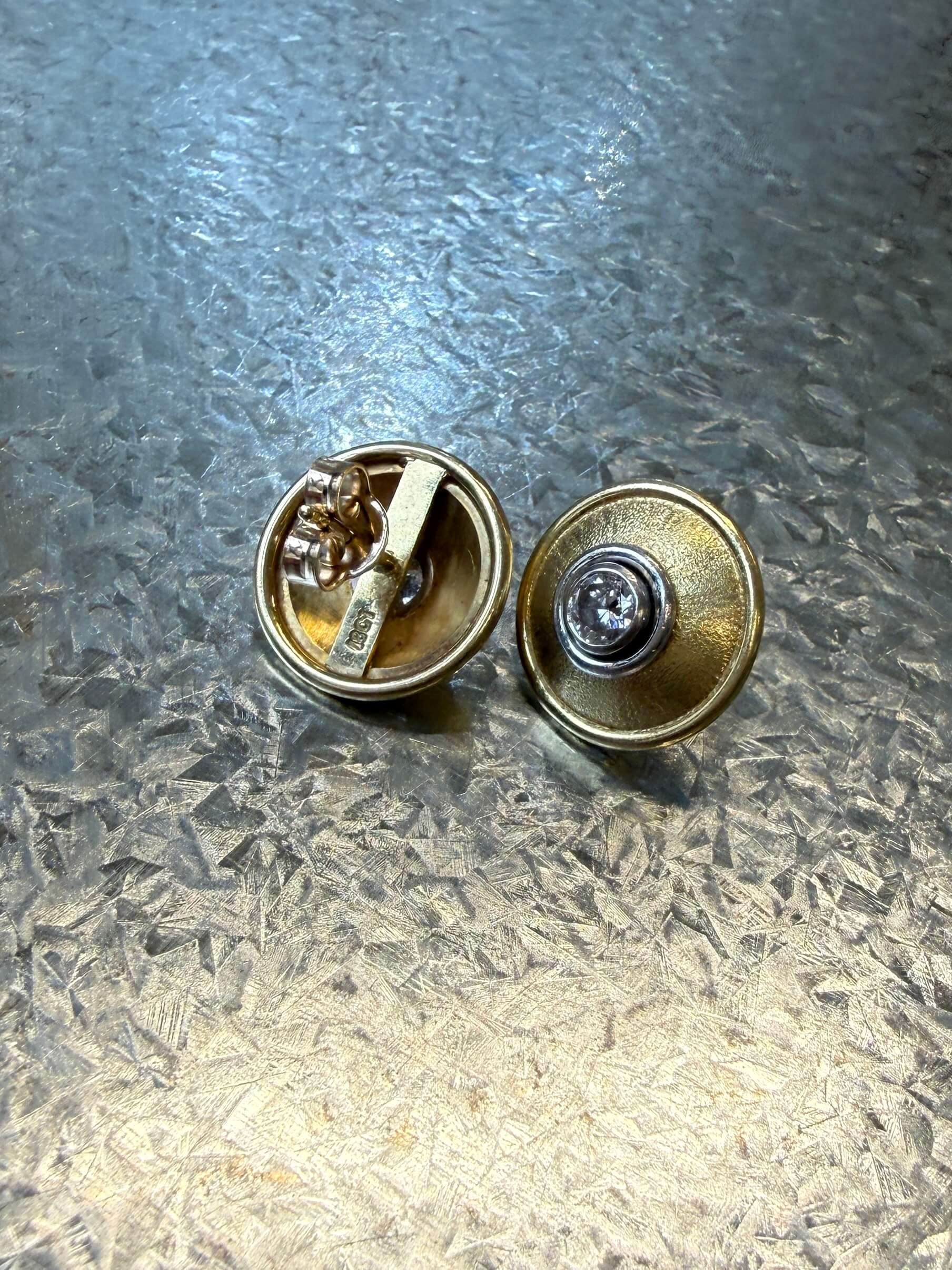 1970's 18ct yellow and white gold diamond earrings . Total diamond weight 0.46 carat.