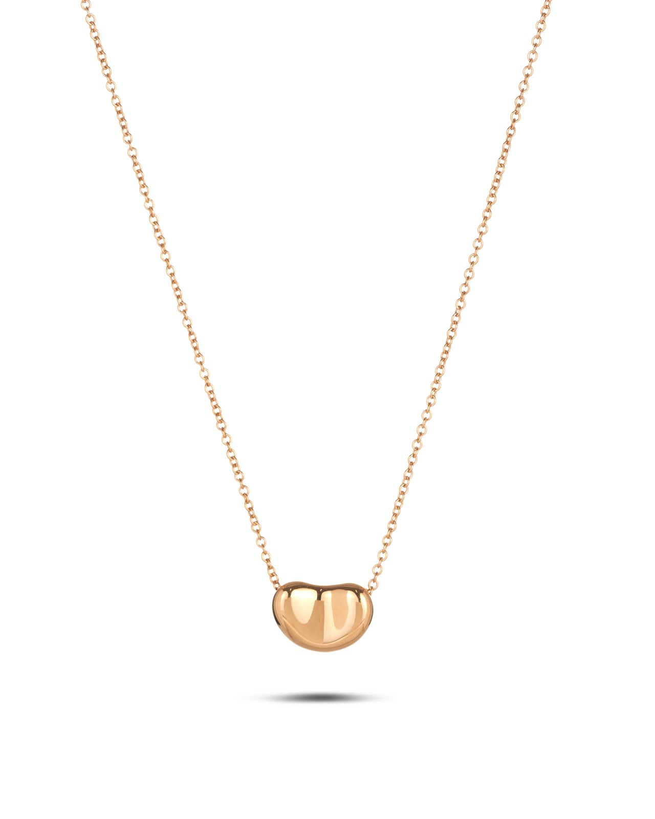 TIFFANY & CO. Gold Bean Pendant Necklace, designed by Elsa Peretti.