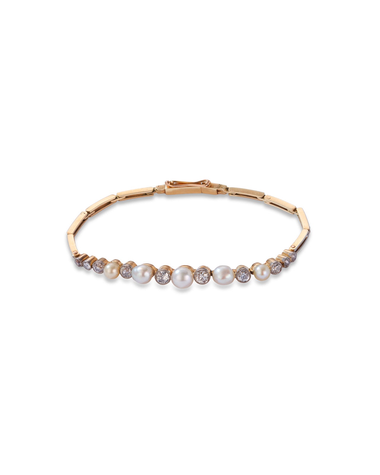 A yellow old antique bracelet featuring a row of white pearls and round old cut diamonds, displayed on a clean white background.