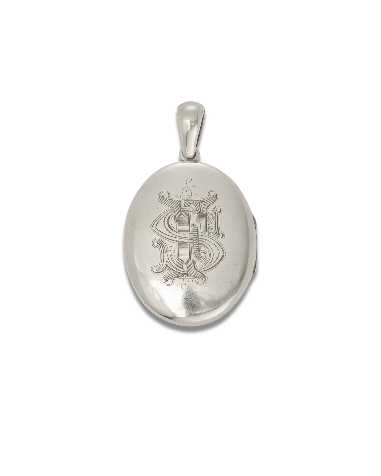 Silver locket - oval. Weight 39.47 grams Length including bale: 6.7 cm