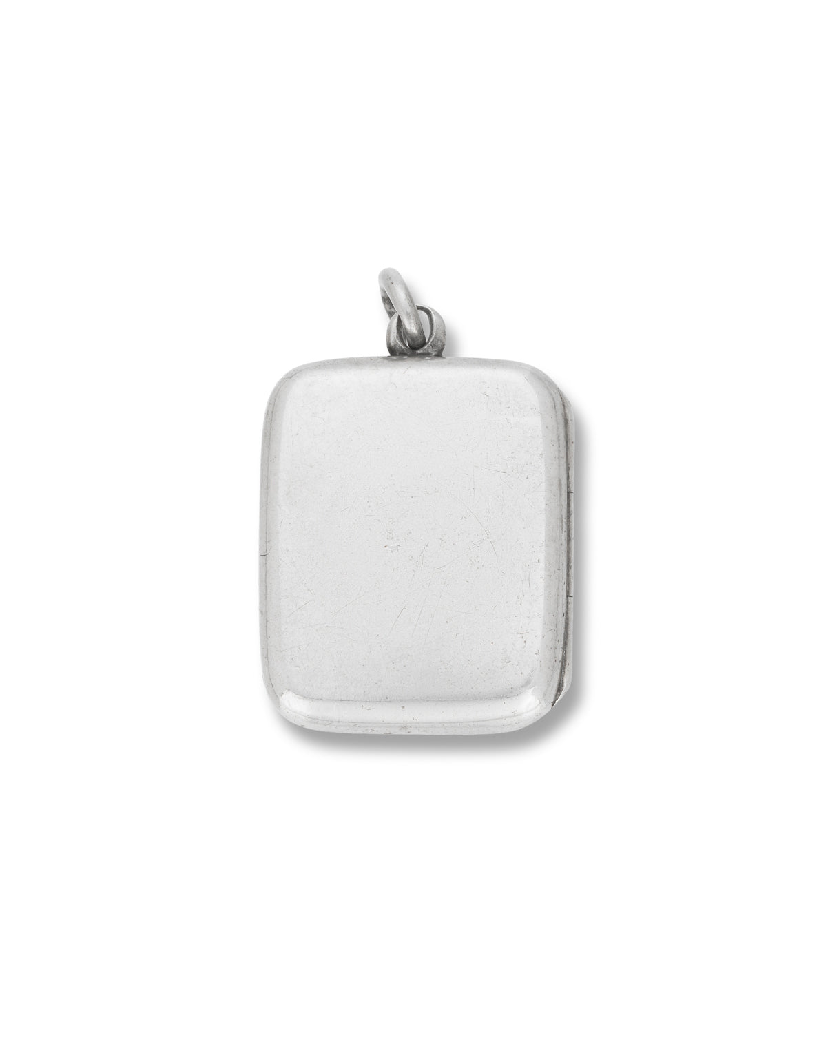Antique Silver Locket, of rectangular plain and polished design, opening to reveal locket compartments containing photos.