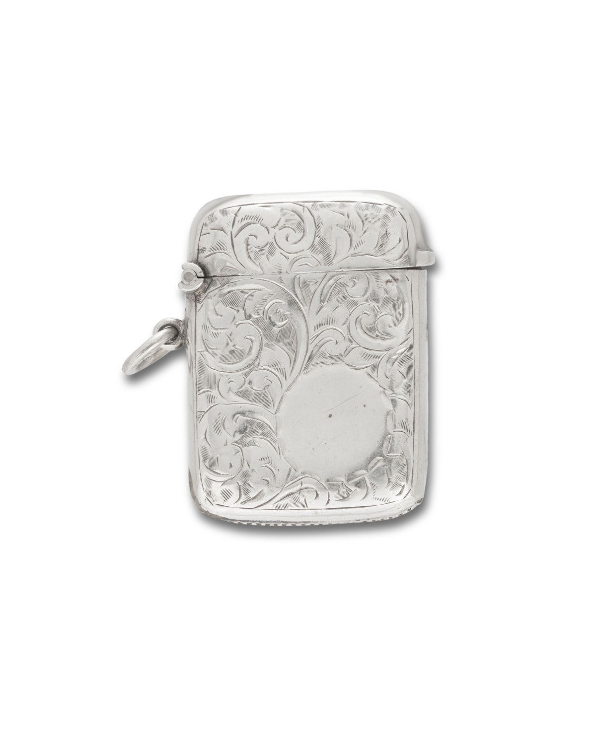 Antique Sterling Silver Vesta, Birmingham 1903. Of rectangular form with engraved foliate decoration and blank circular cartouche.

