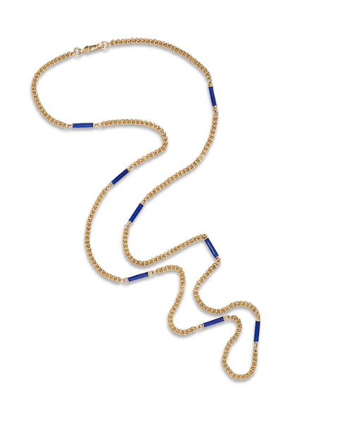 An 18ct yellow gold wheat link necklace featuring tubular segments decorated in royal  blue enamel. Displayed on a clean white background.