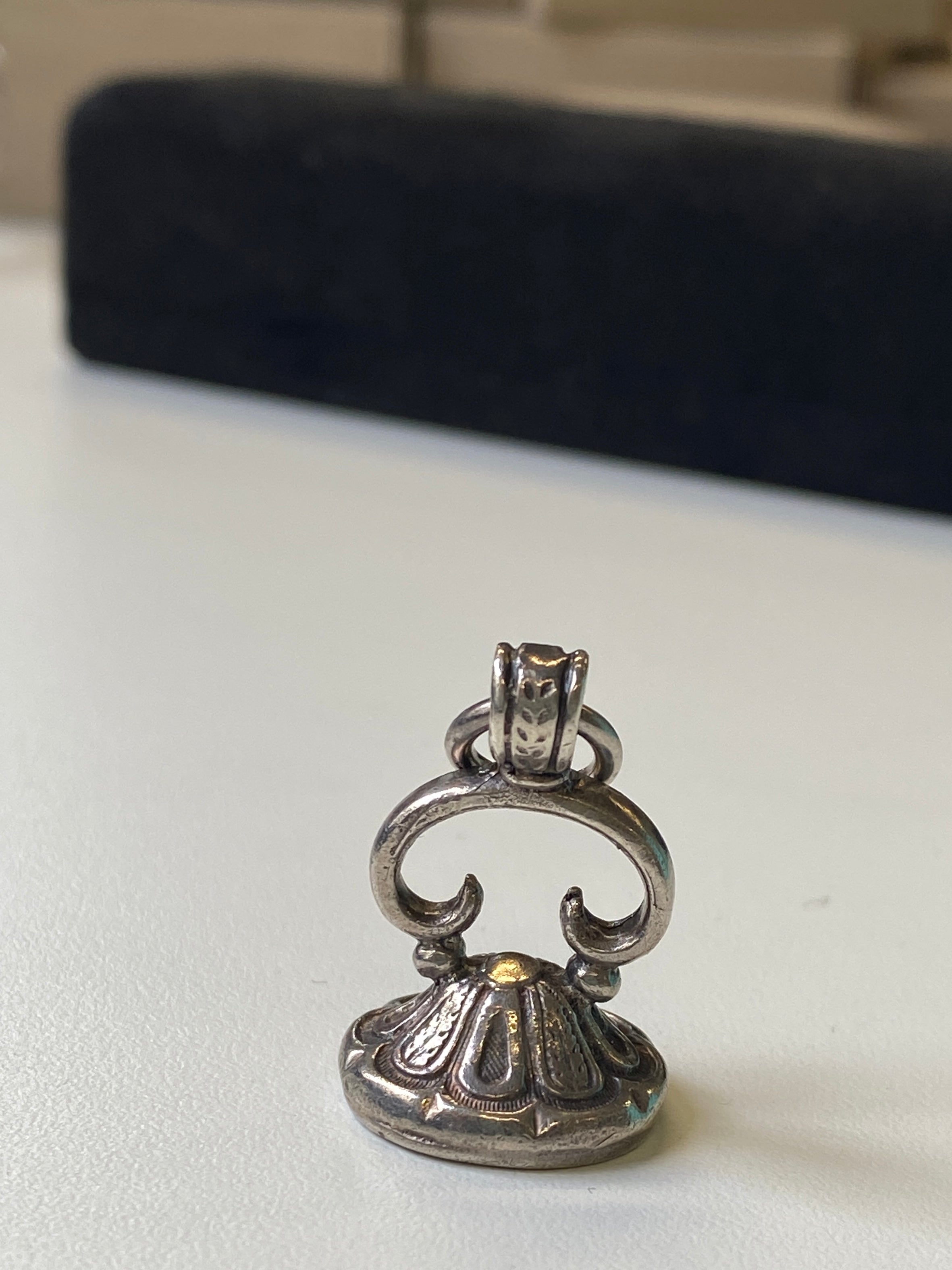 Antique Style Silver Seal, a great addition for your silver watch chain, or wear as a pendant on a long silver chain. The base is solid silver and unengraved.
