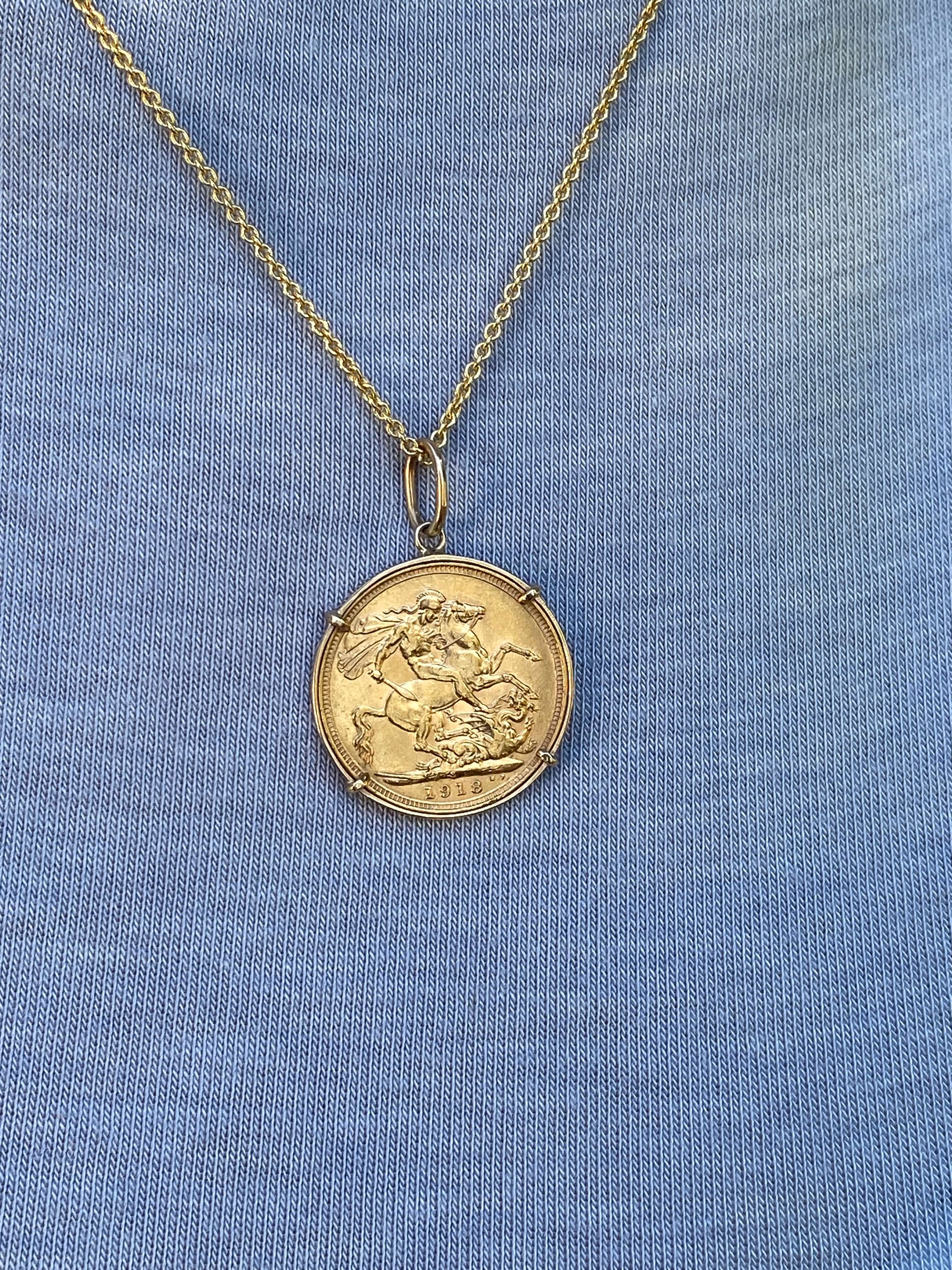 Antique Gold Sovereign Pendant, Sydney Mint, dated 1918. The antique coin set in a simple gold frame