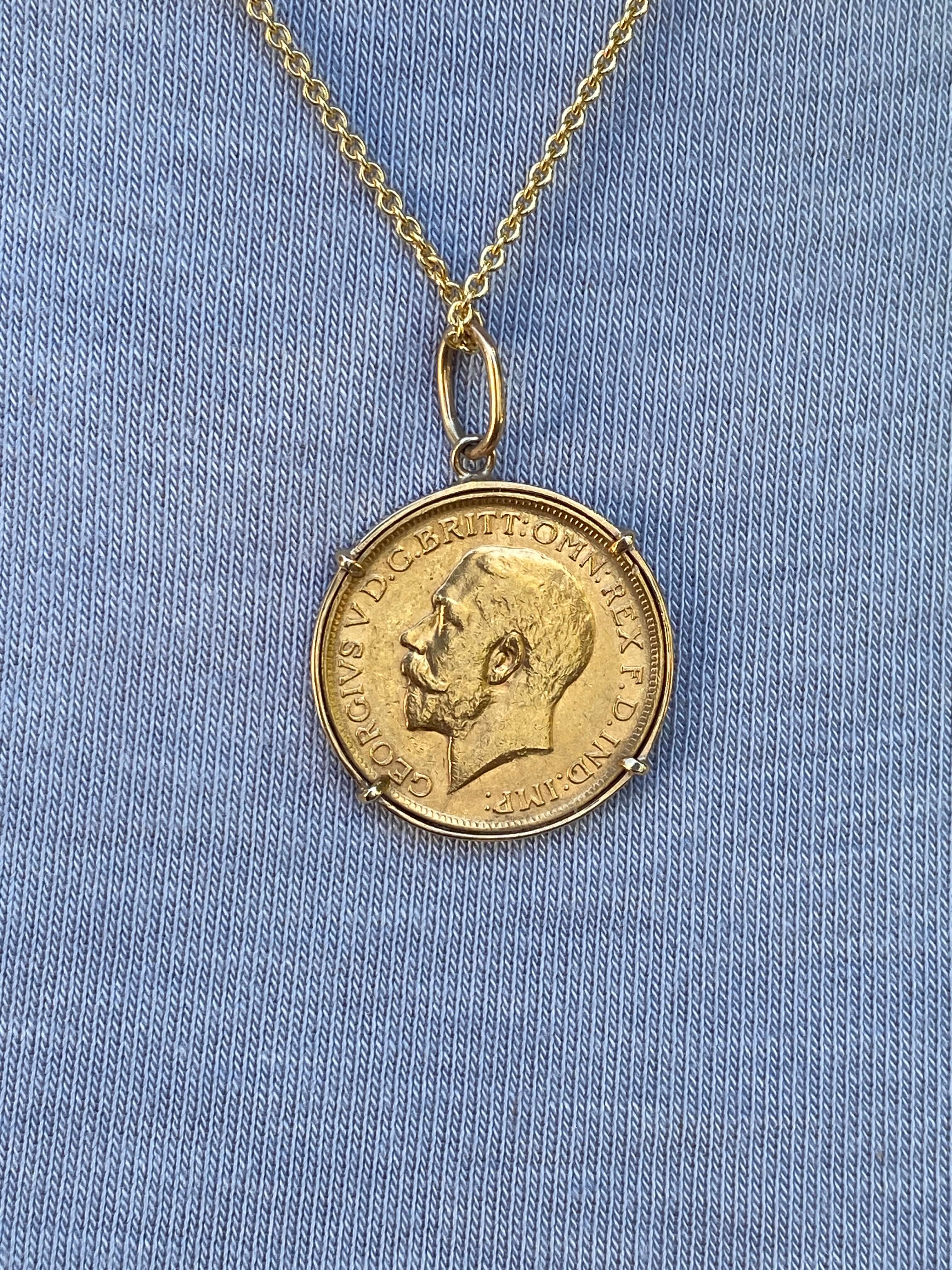 Antique Gold Sovereign Pendant, Sydney Mint, dated 1918. The antique coin set in a simple gold frame