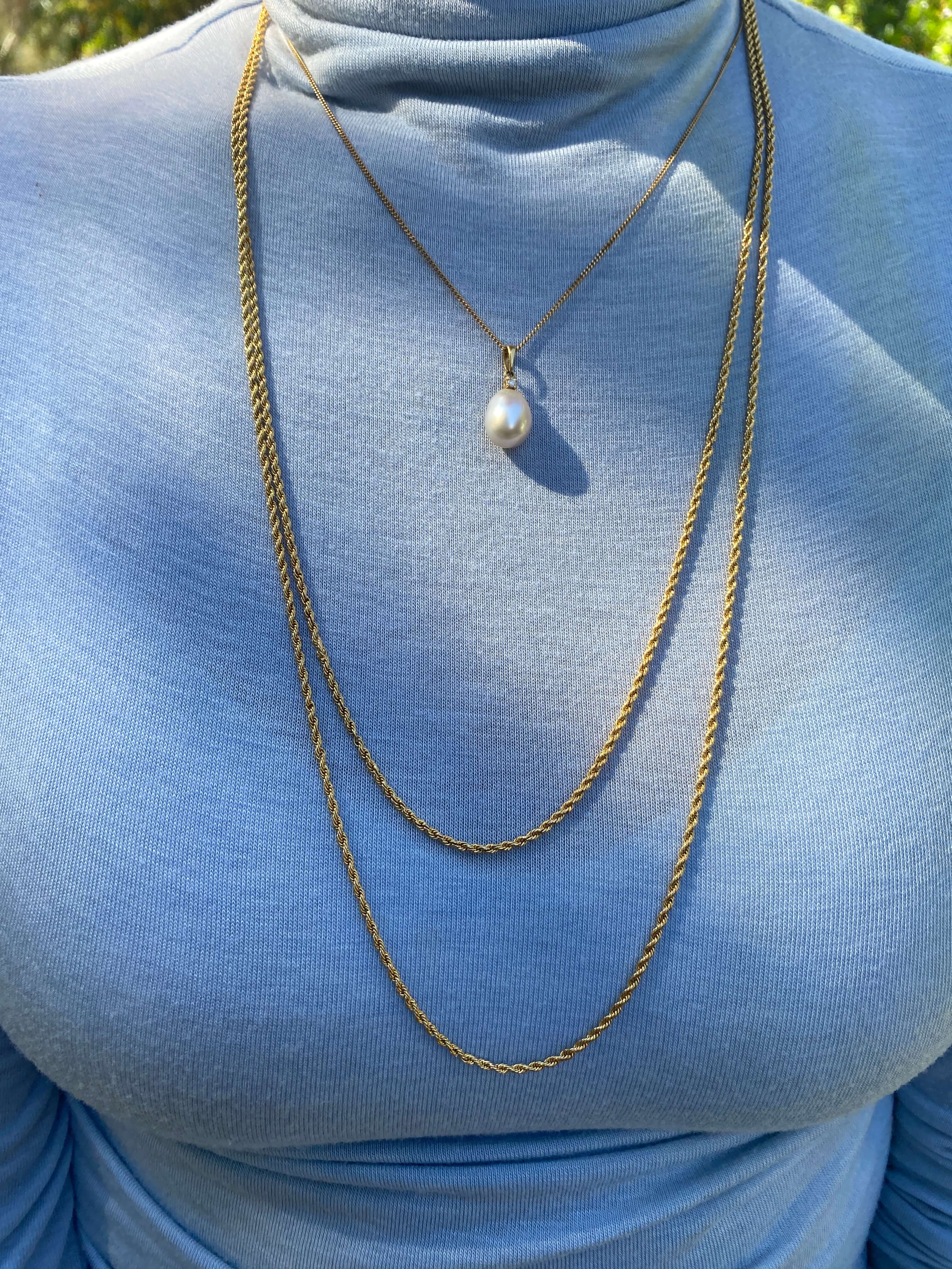 Antique Gold Rope Twist Necklace. Of excellent quality, the double strand, graduating necklace is secured with a bolt ring clasp. 15ct yellow gold. 20.4 grams.