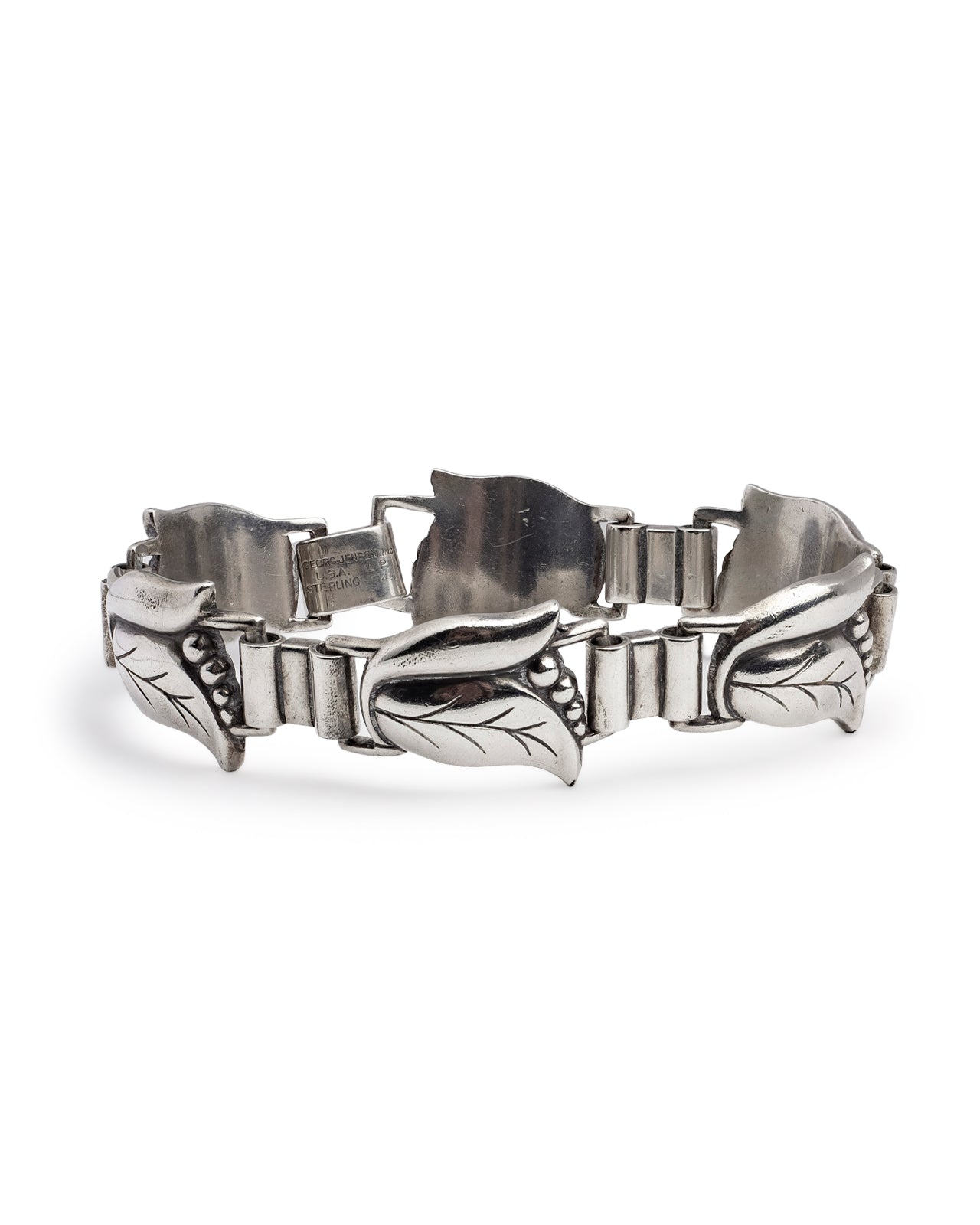 Vintage Georg Jensen USA sterling silver leaf bracelet, No. 145, by Alphonse La Paglia, showing hinged panel links and hallmark stamp