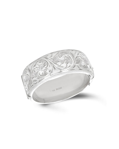 Vintage English Sterling Silver Bangle, c1970. The hinged bangle with all over engraved foliate decoration