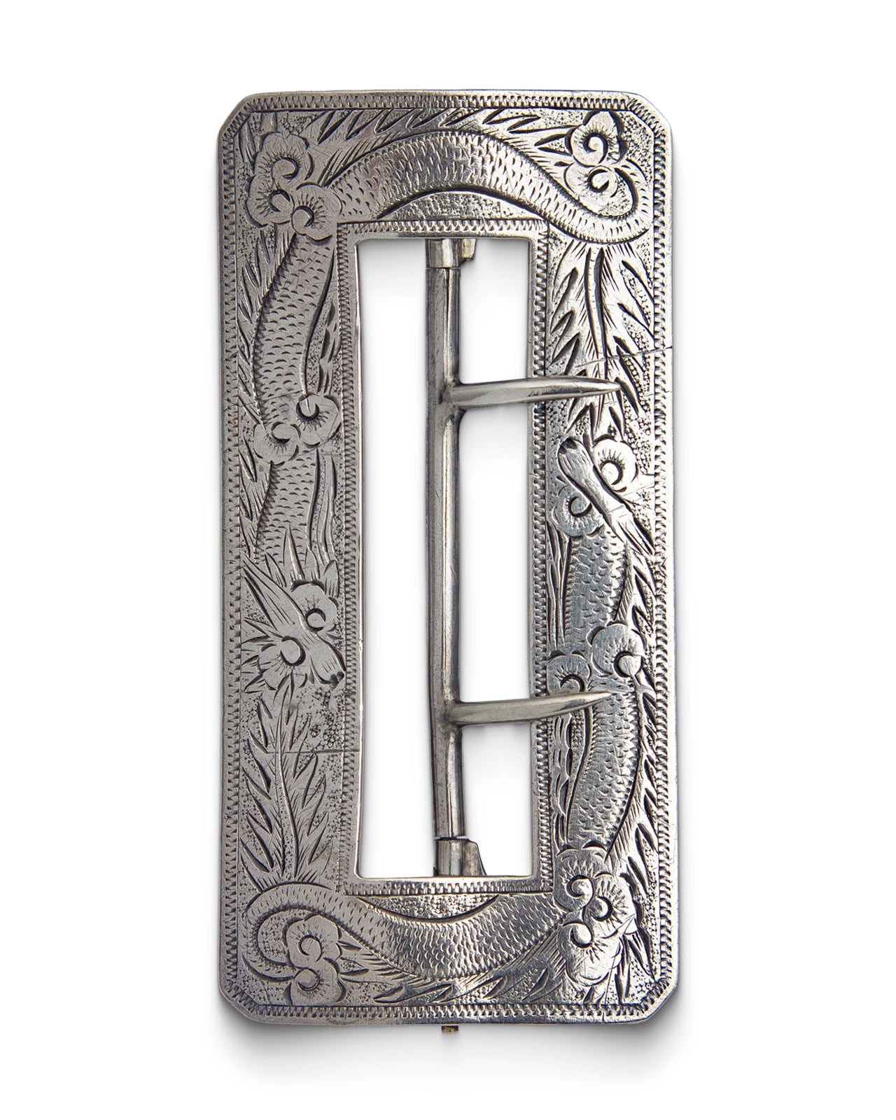 An ornate silver-toned metal belt buckle with intricate dragon engraving, shown against a plain white background.