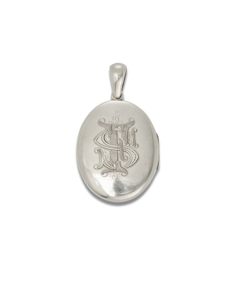 Silver locket - oval. Weight 39.47 grams Length including bale: 6.7 cm